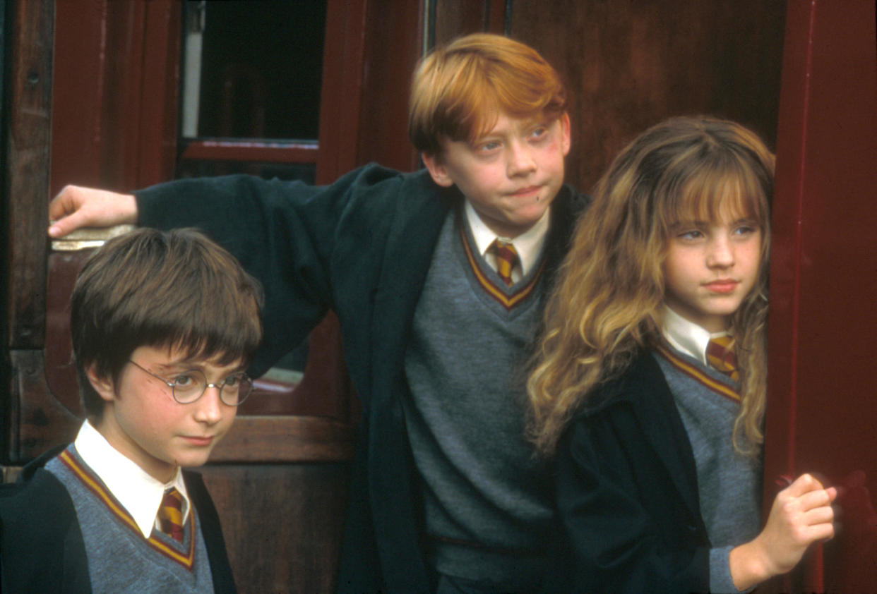 RELEASE DATE: Nov 04, 2001. MOVIE TITLE: Harry Potter And The Sorcerer's Stone. STUDIO: Fox. PLOT: On his 11th birthday, young Harry Potter discovers the life he never knew he had, the life of a wizard. In his first year at Hogwarts School of Witchcraft and Wizardry, he meets his two best friends Ron Weasley, an expert at Wizard Chess, and Hermione Granger, a girl with non-magic parents. Harry learns the game of Quiditch and Wizard Chess on his way to facing a Dark Arts teacher who is bent on destroying him. PICTURED: DANIEL RADCLIFFE as Harry Potter, RUPERT GRINT as Ron Weasley, EMMA WATSON a