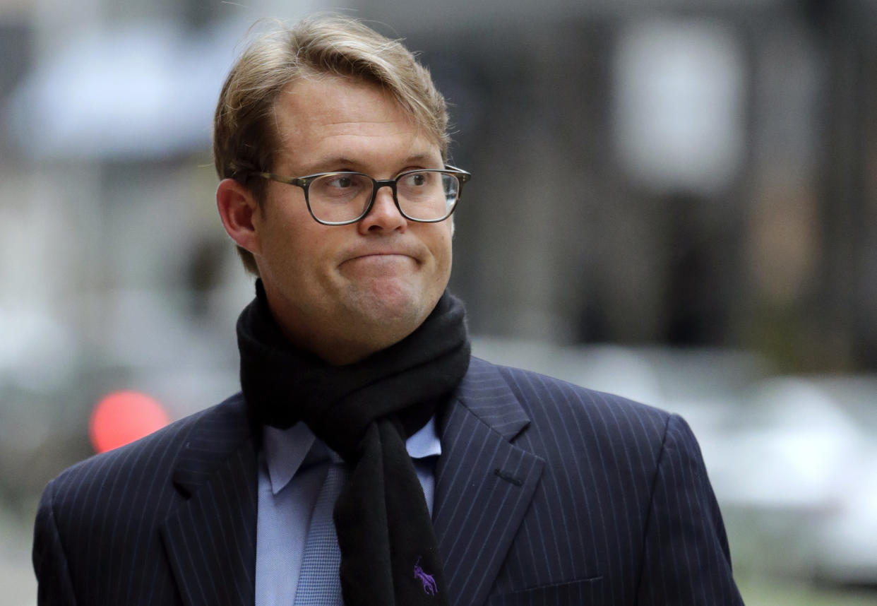 FILE - Mark Riddell arrives at federal court in Boston on April 12, 2019. Riddell, a former Florida prep school administrator who took college entrance exams for students in exchange for cash to help wealthy parents get their kids into elite universities, is facing sentencing in Boston federal court on Friday, April 8, 2022. (AP Photo/Charles Krupa, File)