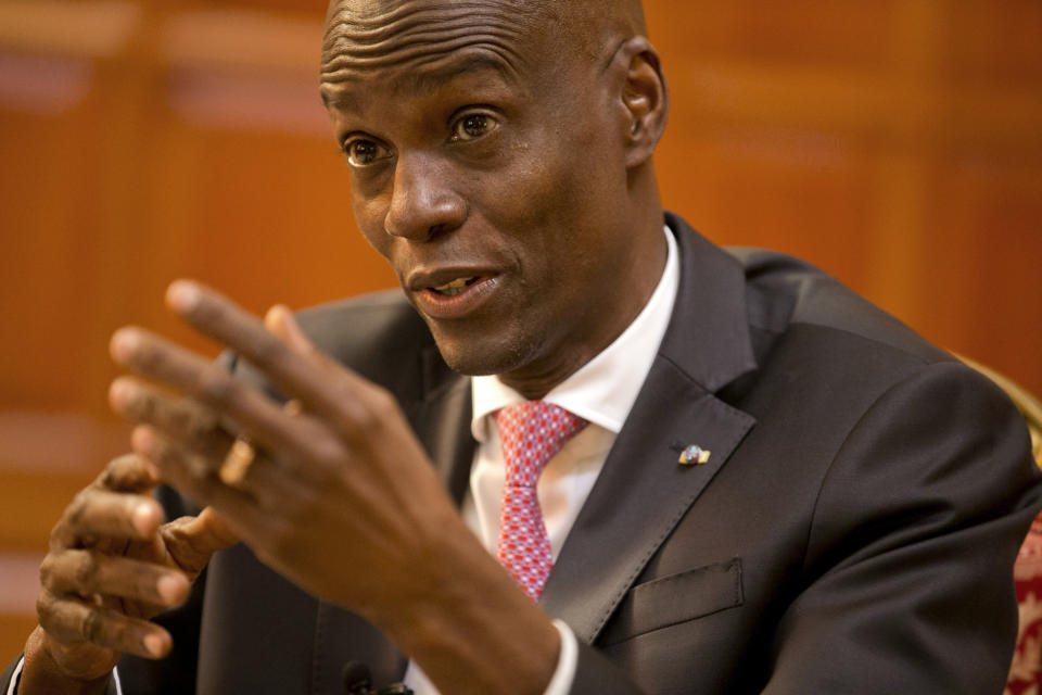 Haiti's President Jovenel Moise speaks during an interview at his home in Petion-Ville, a suburb of Port-au-Prince, Haiti, Friday, Feb. 7, 2020. Moise said Friday he wanted a new constitution to stipulate that presidential proposals would automatically pass if the National Assembly did not vote them up or down within 60 days. (AP Photo/Dieu Nalio Chery)