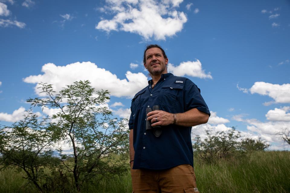 Chris Bugbee from the Center for Biological Diversity stands in the Cienega Creek Natural Preserve near Tucson on Aug. 4, 2022.