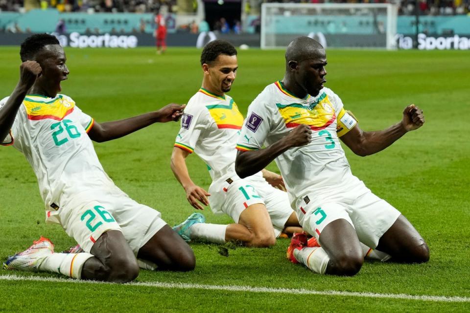 Celebration: Kalidou Koulibaly scored a dramatic winning goal for Senegal against Ecuador in Doha  (AP)