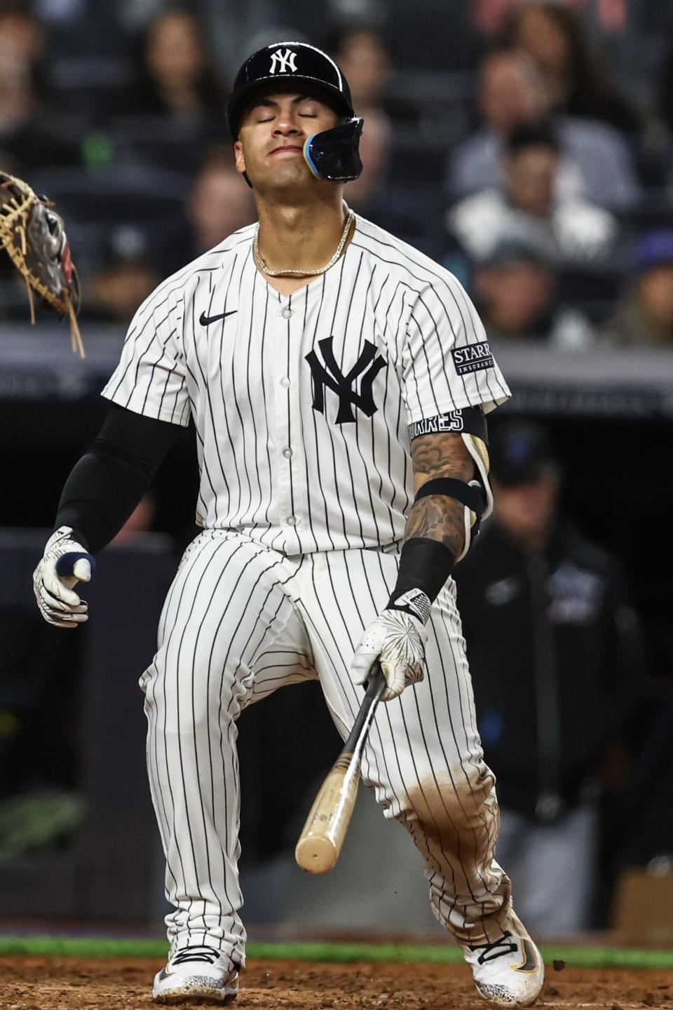 Apr 10, 2024; Bronx, New York, USA; New York Yankees second baseman Gleyber Torres (25) reacts after being called out on strikes to end the sixth inning against the Miami Marlins at Yankee Stadium. Mandatory Credit: Wendell Cruz-USA TODAY Sports