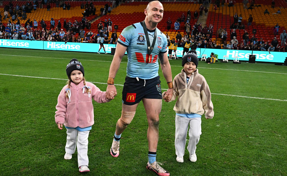 Dylan Edwards, pictured here with his daughters after State of Origin 3.