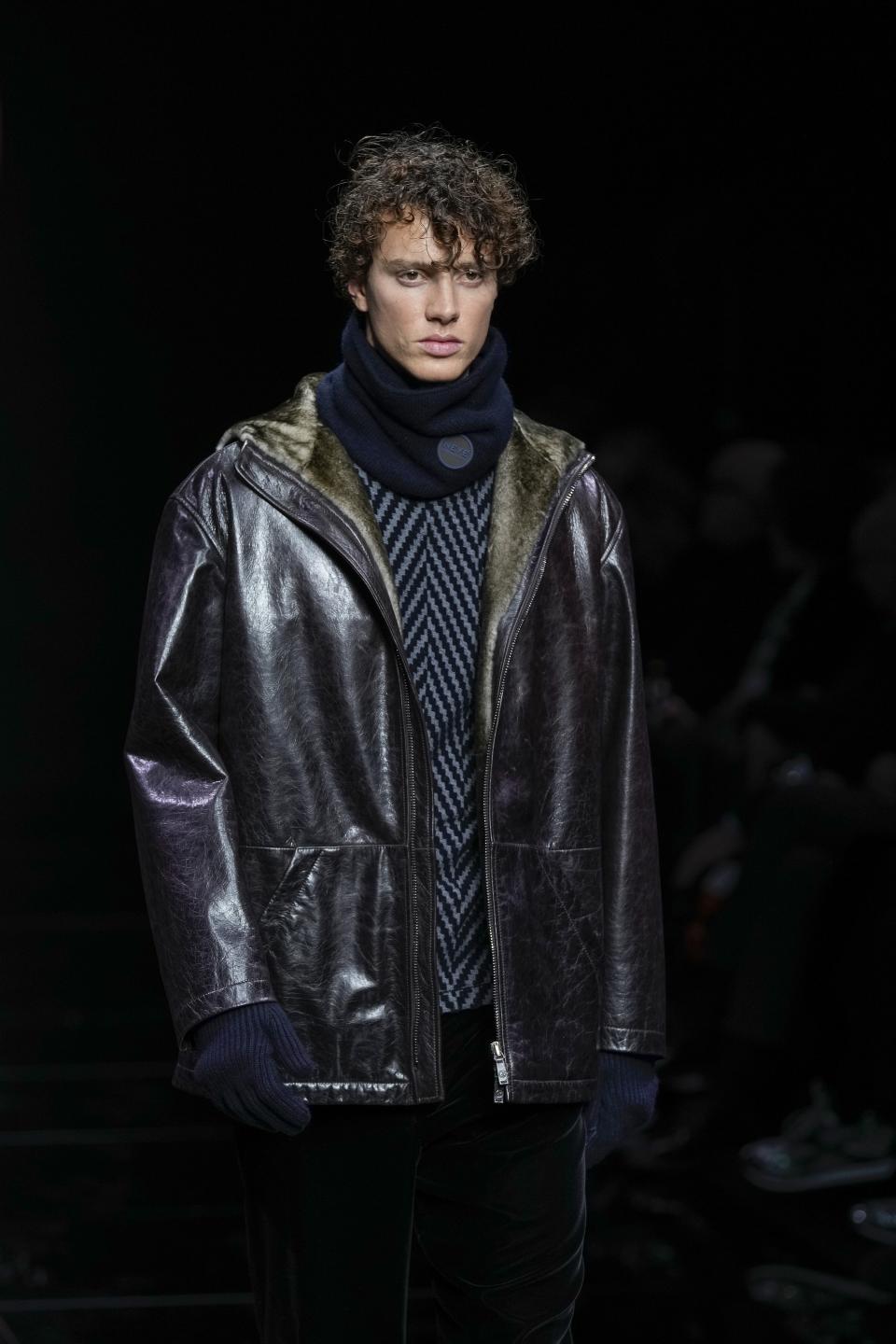 A model wears a creation part of the men's Giorgio Armani Fall-Winter 2024-2025 collection, that was presented in Milan, Italy, Sunday, Jan. 14, 2024. (AP Photo/Antonio Calanni).