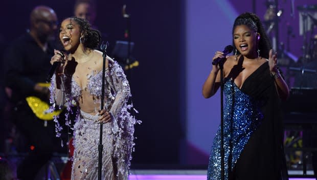 Chloe and Halle Bailey (Chloe x Halle) perform at the MusiCares Persons of the Year Gala in <a href="https://parade.com/living/february-holidays-observances" rel="nofollow noopener" target="_blank" data-ylk="slk:February;elm:context_link;itc:0;sec:content-canvas" class="link ">February</a> 2023<p>VALERIE MACON/AFP via Getty Images</p>