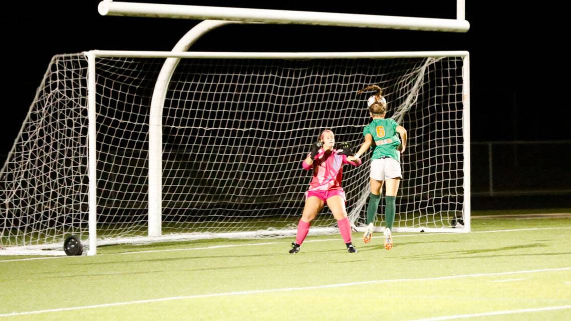 Frederick Douglass midfielder Ella Flynn jumps for a header to score the go-ahead goal in the Broncos’ 2-1 win over Bethlehem at The Farm in Lexington on Wednesday night.