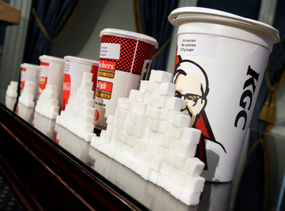 Sugar cubes and soft drink cups
