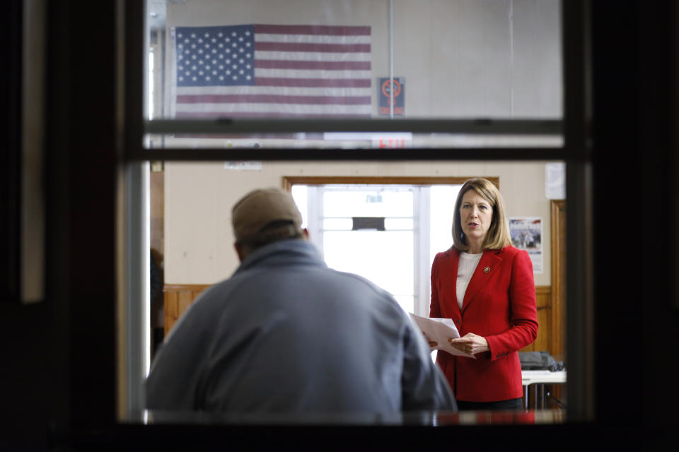 In this Nov. 11, 2019, photo, U.S. Rep. Cindy Axne, D-Iowa, speaks to local residents at the American Legion Post 184 in Winterset, Iowa. Axne defeated a Republican incumbent in 2018 even as she lost 15 of her district's 16 counties. Axne won by offsetting her losses in rural counties with an overwhelming victory in urban Polk County. (AP Photo/Charlie Neibergall)