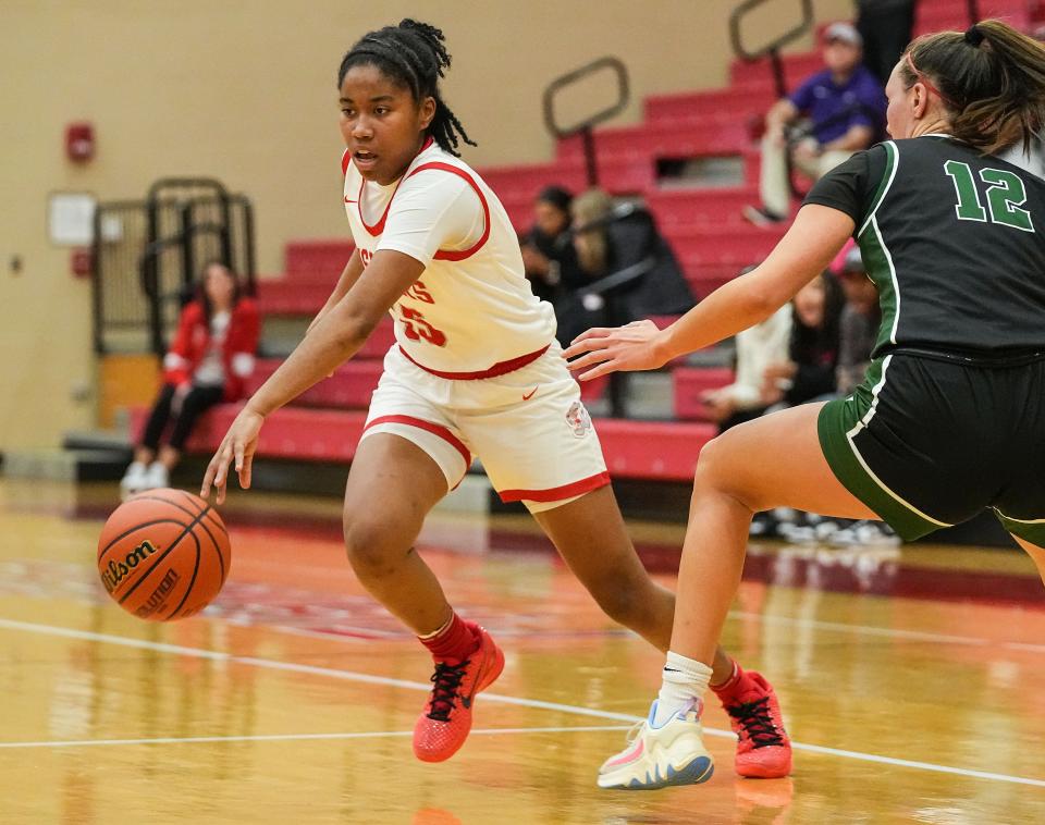 Fishers Tigers Talia Harris (15) rushes up the court Tuesday, Nov. 21, 2023, during the game at Fishers High School in Fishers. The Fishers Tigers defeated the Zionsville Eagles, 46-38.