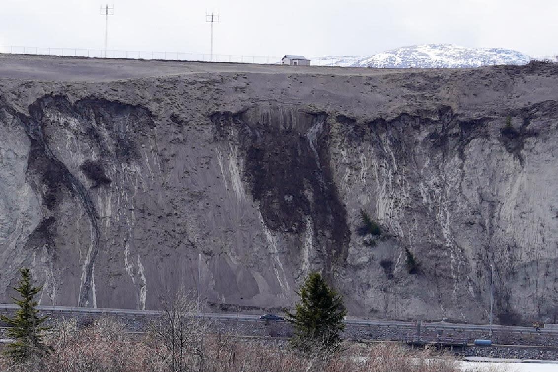 There was a small slide at Robert Service Way on Thursday. The city is asking residents to be cautious in the area.  (City of Whitehorse  - image credit)