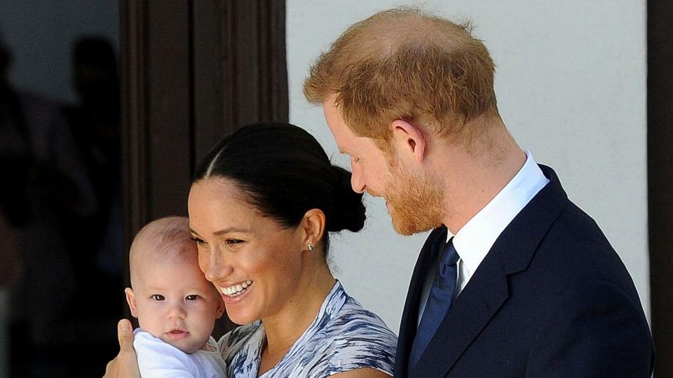 Prince Harry and Meghan, Duchess of Sussex, holding their son Archie