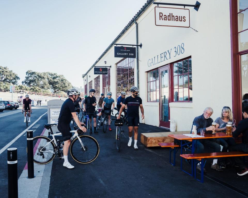 group of bikers pulling up to brewery