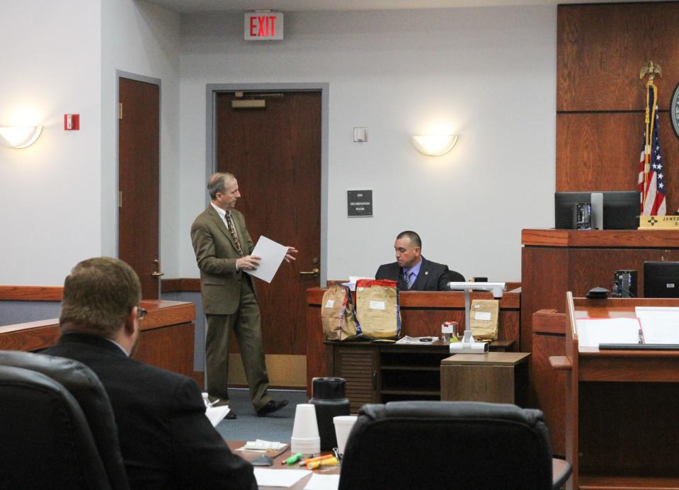 A lawyer with 12th Judicial District Attorney John P. Sugg's legal team questions Fabian Picazo, a detective involved with the AZ Boys case.