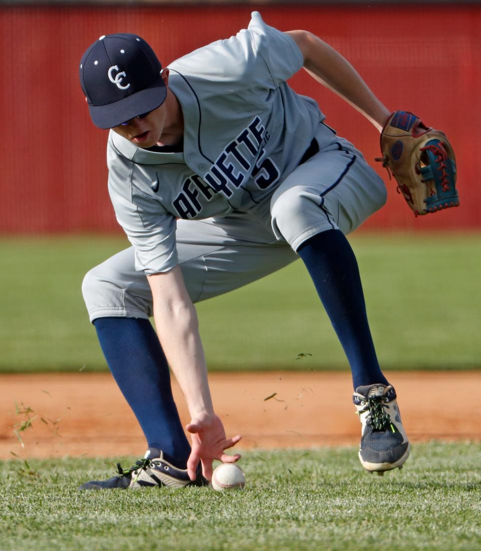 Central Catholic Knights Kolton Minnich (5) fields a ground ball during the IHSAA baseball game against the Twin Lakes, Wednesday, May 8, 2024, at the Twin Lakes High School in Monticello, Ind. Twin Lakes won 5-2.