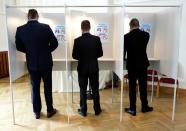 People cast their votes during Estonia's general election in Parnu