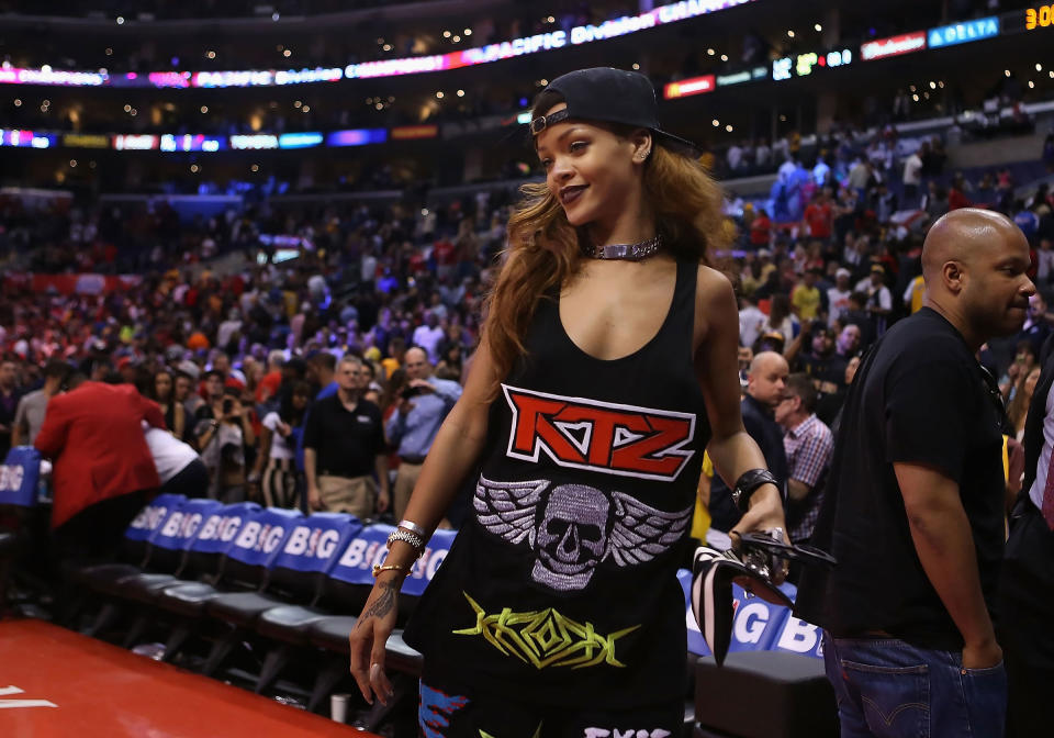 Rihanna walks off the court following the NBA game between the Los Angeles Lakers and the Los Angeles Clippers in Los Angeles, on April 7, 2013.<span class="copyright">Christian Petersen—Getty Images</span>