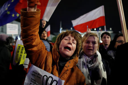 People gather in front of the Presidential Palace during a protest against judicial reforms in Warsaw, Poland, November 24, 2017. REUTERS/Kacper Pempel