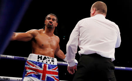 FILE PHOTO: Boxing - Tony Bellew vs David Haye - O2 Arena, London, Britain - May 5, 2018 David Haye receives a count from the referee after being knocked down by Tony Bellew Action Images via Reuters/Andrew Couldridge/File Photo