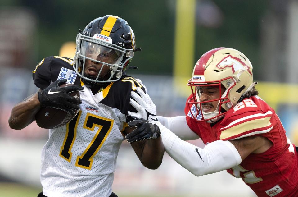 Pittsburgh Maulers receiver Isiah Hennie is pushed out of bounds by Birmingham Stallions defender Lorenzo Burns in the first half during the USFL Championship Game at Tom Benson Hall of Fame Stadium, Saturday, July 1, 2023, in Canton.