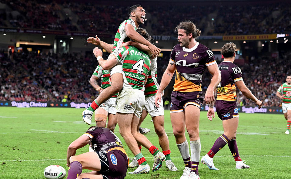 Graham Campbell, pictured here celebrating with Rabbitohs teammates after a try against the Broncos.