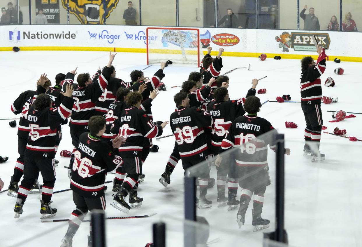 St. Charles celebrates a 4-2 win over Olentangy Liberty in the regional final Saturday at OhioHealth Ice Haus.