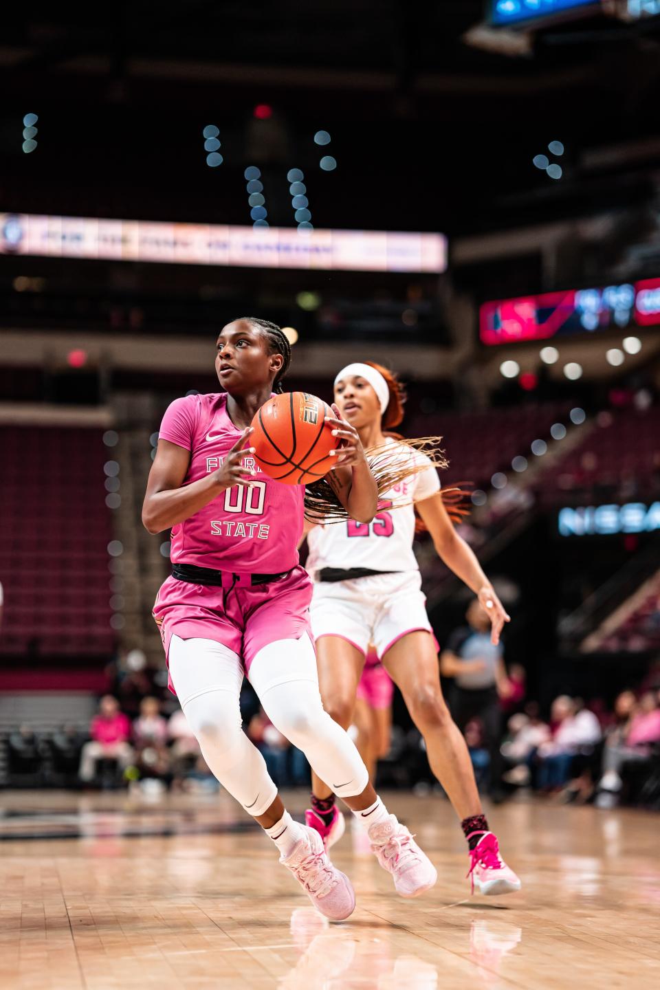 Florida State guard Ta'Niya Latson (00) drives to the hoop in an ACC women's basketball game on Feb. 16, 2023.