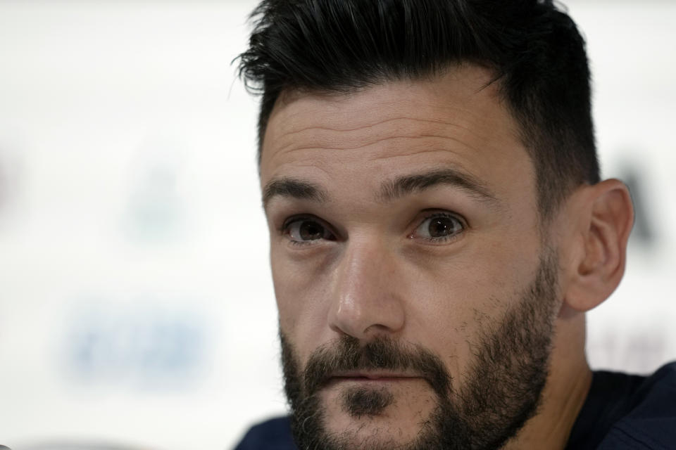 France's goalkeeper Hugo Lloris listens to a reporter during a press conference on the eve of the group D World Cup soccer match between France and Denmark, in Doha, Qatar, Friday, Nov. 25, 2022. (AP Photo/Christophe Ena)