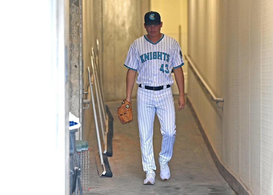 Garrett Davila walks down the player’s tunnel at Charlotte’s Truist Field. He was a fourth-round pick in the 2015 Major League Baseball draft.