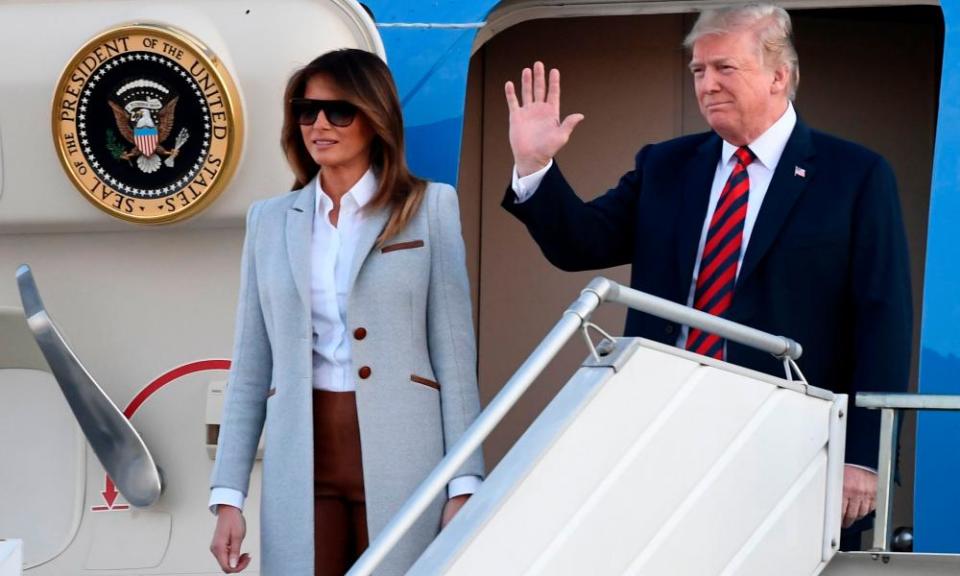 Donald and Melania Trump leave Air Force One upon arrival in Helsinki