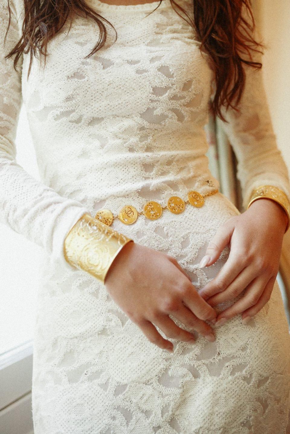 a woman holding a piece of food