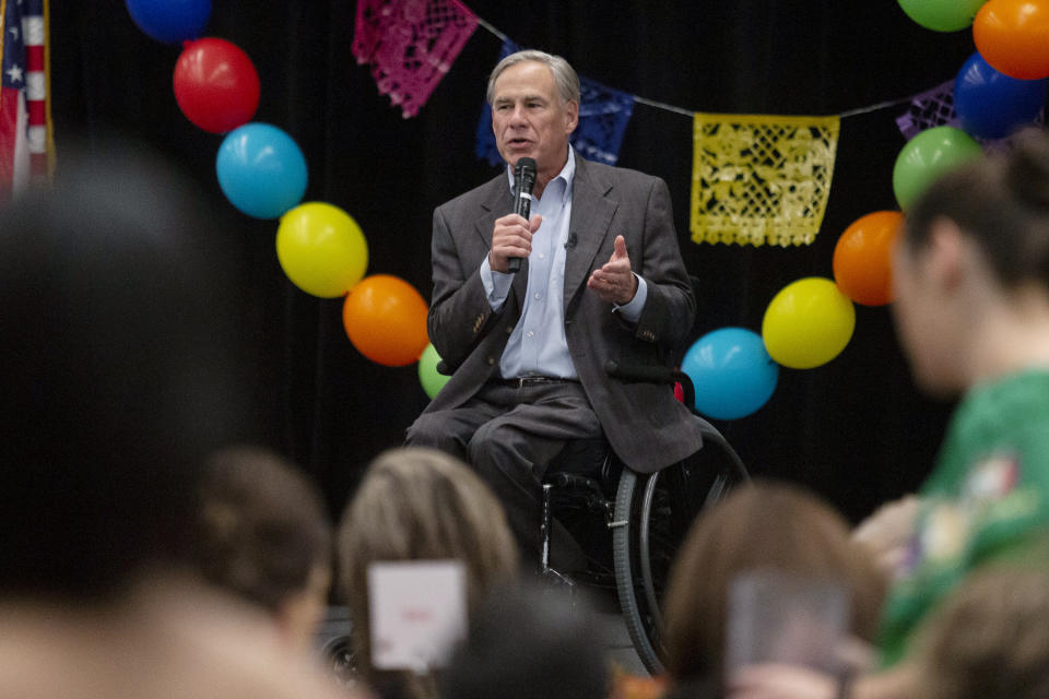 FILE- Texas Gov. Greg Abbott speaks on a variety of matters at the Midland Chapter of the Republican National Hispanic Assembly's Reagan Lunch at the Bush Convention Center, Friday, Nov. 5, 2021, in Midland, Texas. Democrat Beto O'Rourke said Tuesday, Jan. 18, 2022, that his campaign for Texas governor raised $7.2 million in the first six weeks of a race that could wind up as one of the nation's most expensive in 2022. At the same time, Abbott for years has shown an ability to raise millions of dollars in a matter of days from executives of some of Texas’ largest corporations and energy firms. (Jacob Ford/Odessa American via AP, File)