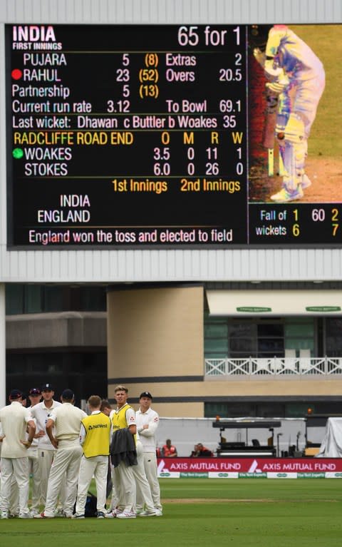 England watch the board as India wrongly review an lbw - Credit: afp