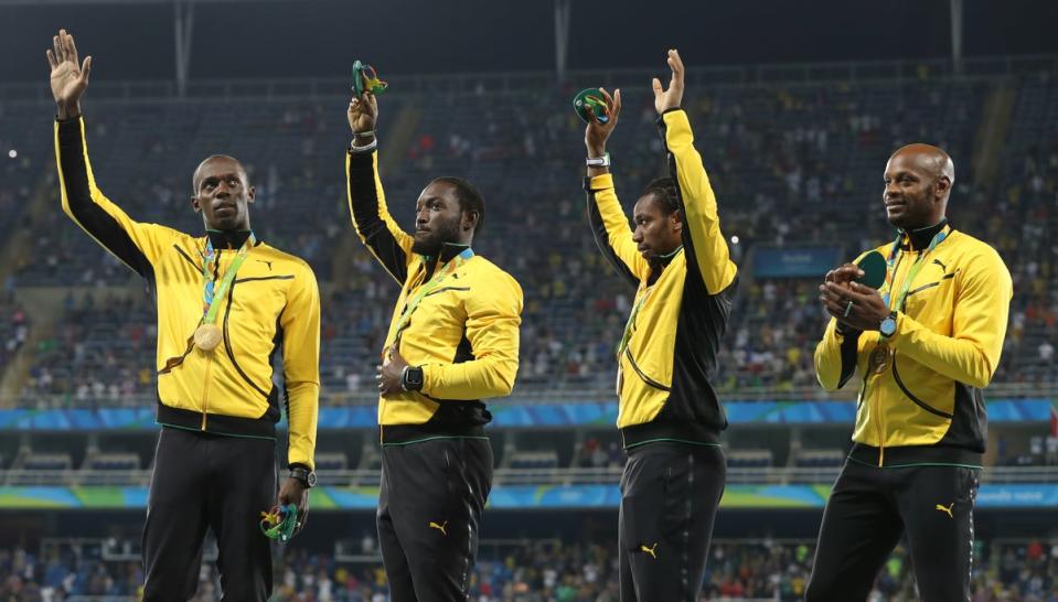 Bolt would finish the Games with three golds – also winning the 200m and then the 4x100m relay (Martin Rickett/PA) (PA Archive)