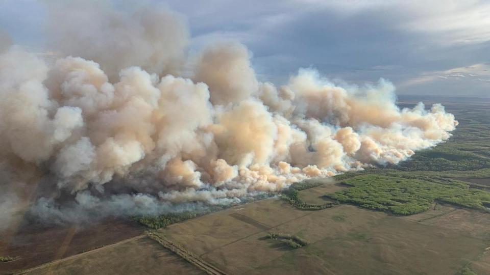 PHOTO: This aerial handout picture courtesy of the Alberta Wildfire Service shows smoke from wildfires burning in the Grande prairie forest area in Alberta, Canada, May 10, 2024. (Alberta Wildfire Service/AFP via Getty Images)