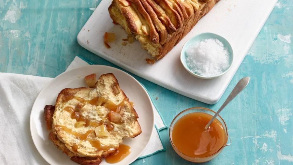 <p>Yes, "pull-apart" bread means you get to eat this with your hands. Drizzle on the caramel sauce for an unforgettable breakfast treat.</p><p><em><a href="https://www.womansday.com/food-recipes/food-drinks/recipes/a12431/apple-cinnamon-pull-apart-bread-recipe-wdy0315/" rel="nofollow noopener" target="_blank" data-ylk="slk:Get the recipe from Woman's Day »;elm:context_link;itc:0;sec:content-canvas" class="link ">Get the recipe from Woman's Day »</a></em></p>