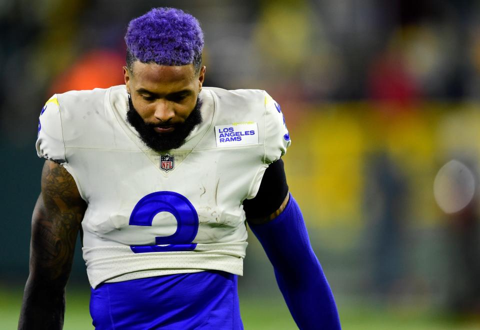 Odell Beckham Jr. #3 of the Los Angeles Rams walks off the field after Los Angeles was defeated by the Green Bay Packers 36-28 at Lambeau Field on November 28, 2021 in Green Bay, Wisconsin.