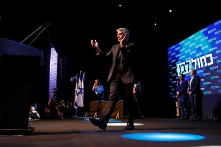 Co-leader of Blue and White party Yair Lapid arrives at the party's headquarters following the announcement of exit polls during Israel's parliamentary election in Tel Aviv