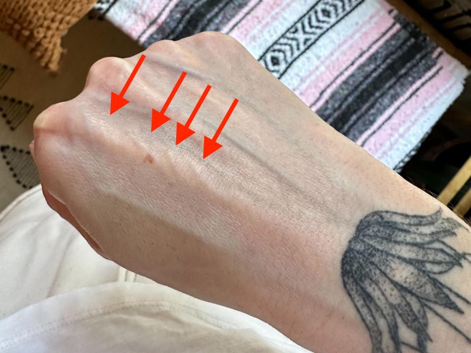 Image showing cording in the authors hand with three lines pointing to it