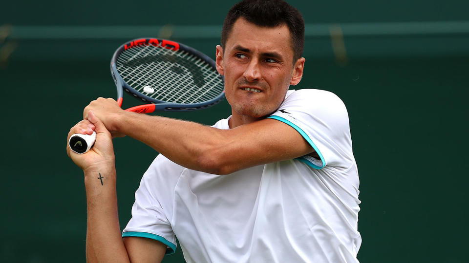 Bernard Tomic, pictured here in action at Wimbledon in 2019. 