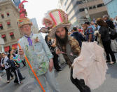 NEW YORK, NY - APRIL 24: Parade goers Noel Macfetrich and Dennis Mcelroy model their hats during the 2011 Easter parade and Easter bonnet festival on the Streets of Manhattan on April 24, 2011 in New York City. (Photo by Jemal Countess/Getty Images)