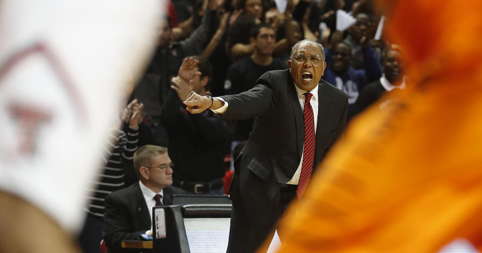 Texas Tech head coach Tubby Smith coaches from the baseline during their NCAA college basketball game in Lubbock, Texas, Saturday, Feb, 8, 2014. (AP Photo/Lubbock Avalanche-Journal, Tori Eichberger) ALL LOCAL TV OUT