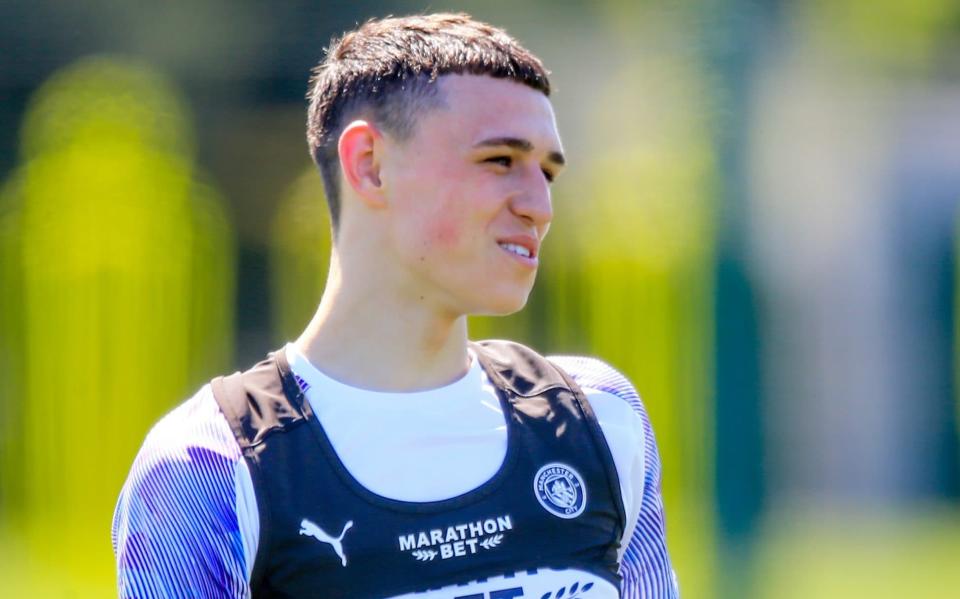 Phil Foden - Tom Flathers/Manchester City FC via Getty Images