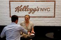 Guests eat cereal at the Kellogg's NYC cafe in Midtown Manhattan in New York City, U.S., June 29, 2016. REUTERS/Brendan McDermid