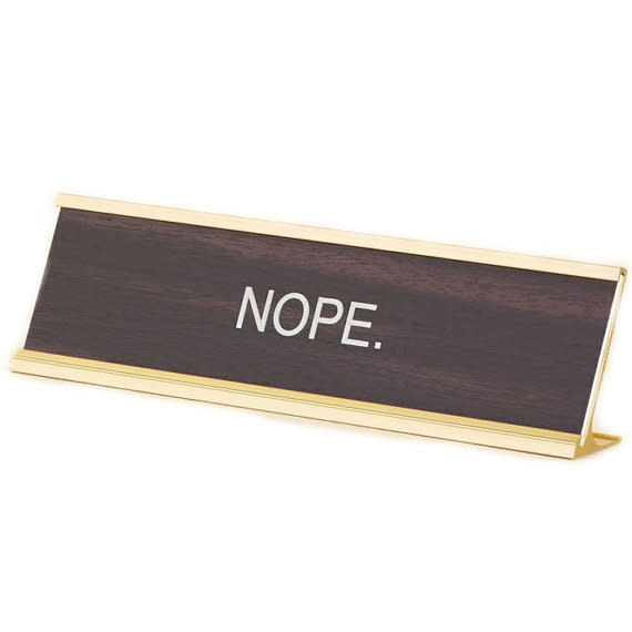 Get it <a href="https://www.etsy.com/listing/483959172/nope-office-desk-name-plate-funny-office?ga_order=most_relevant&amp;ga_search_type=all&amp;ga_view_type=gallery&amp;ga_search_query=nope&amp;ref=sr_gallery-1-6" target="_blank">here</a>.&nbsp;
