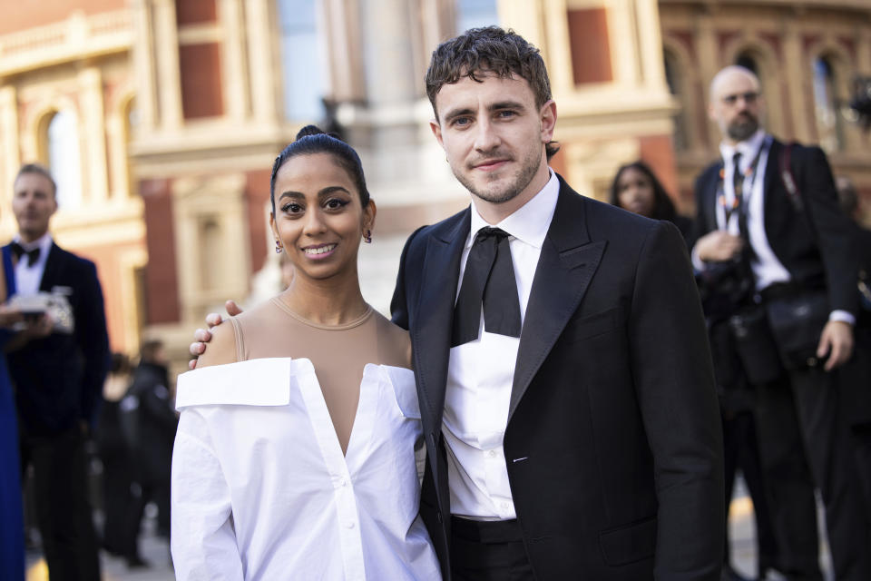 Anjana Vasan, left, and Paul Mescal pose for photographers upon arrival at the Olivier Awards in London, Sunday, April 2, 2023. (Photo by Vianney Le Caer/Invision/AP)