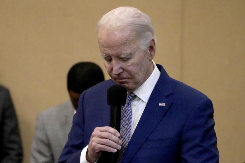 President Biden bows his head in a moment of silence for the three American troops killed Sunday, Jan. 28, 2024, in a drone strike in northeast Jordan, while speaking at the "Sunday Lunch" event at the Brookland Baptist Banquet Center, part of the Brookland Baptist Church, in West Columbia, S.C., on Sunday, Jan. 28, 2024. (AP Photo/Jacquelyn Martin)