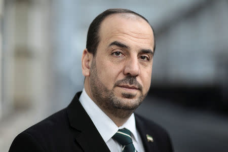 Nasr Hariri, chief negotiator for Syria's main opposition, poses for a photograph in central London, Britain January 16, 2018. REUTERS/Simon Dawson