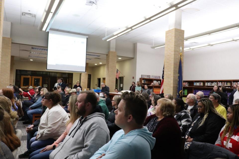 Baugo parents, students and alumni attend a school board meeting at Jimtown High School after a teacher was captured on video striking a student in the hallway on Friday, February 25, 2022.