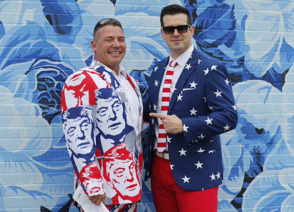 <p>Men wear colorful suits before the 144th running of the Kentucky Derby horse race at Churchill Downs Saturday, May 5, 2018, in Louisville, Ky. (Photo: Jeff Roberson/AP) </p>