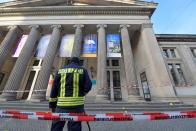 A policeaman stands outside Green Vault city palace after a robery in Dresden